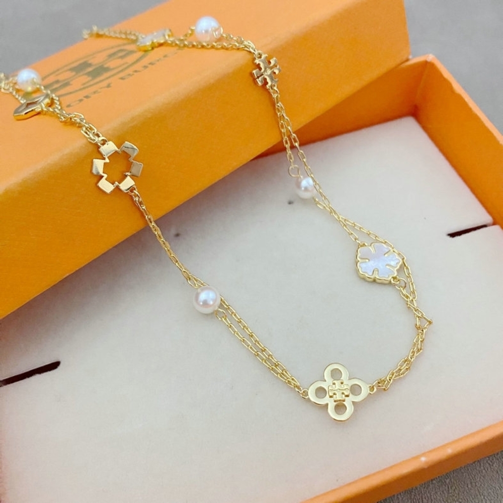 Tory Burch Elegant Gold Necklace with Pearl Accents